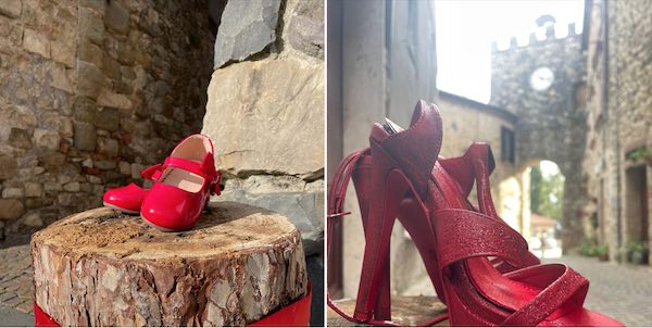 Scarpe rosse sparse nel borgo come monito contro la violenza sulle donne